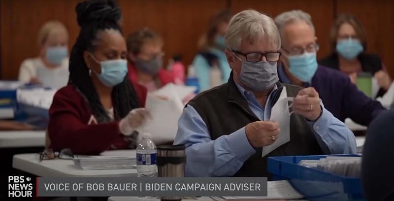 workers counting ballots