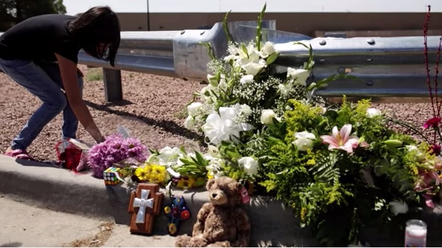 Flowers at a memorial for the mass shooting victims
