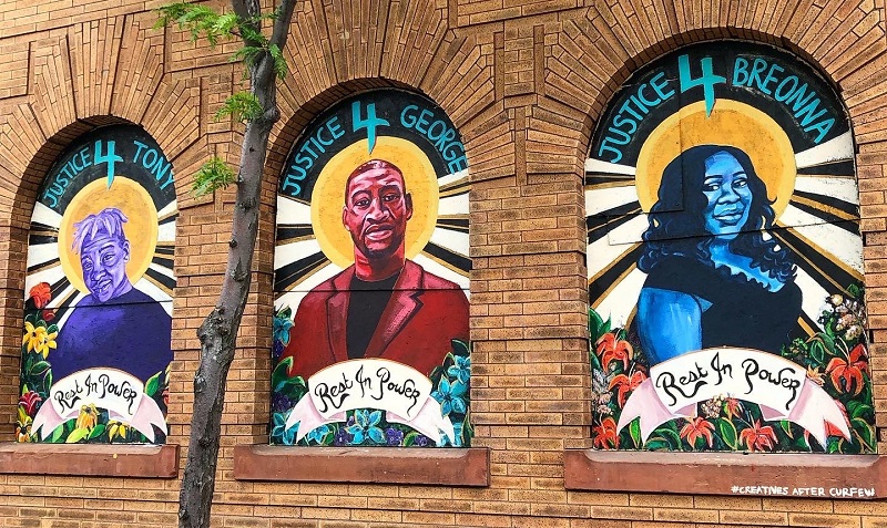 A mural depicting George Floyd, Tony McDade, and Breonna Taylor created by artist Leslie Barlow in Minneapolis, Minnesota.